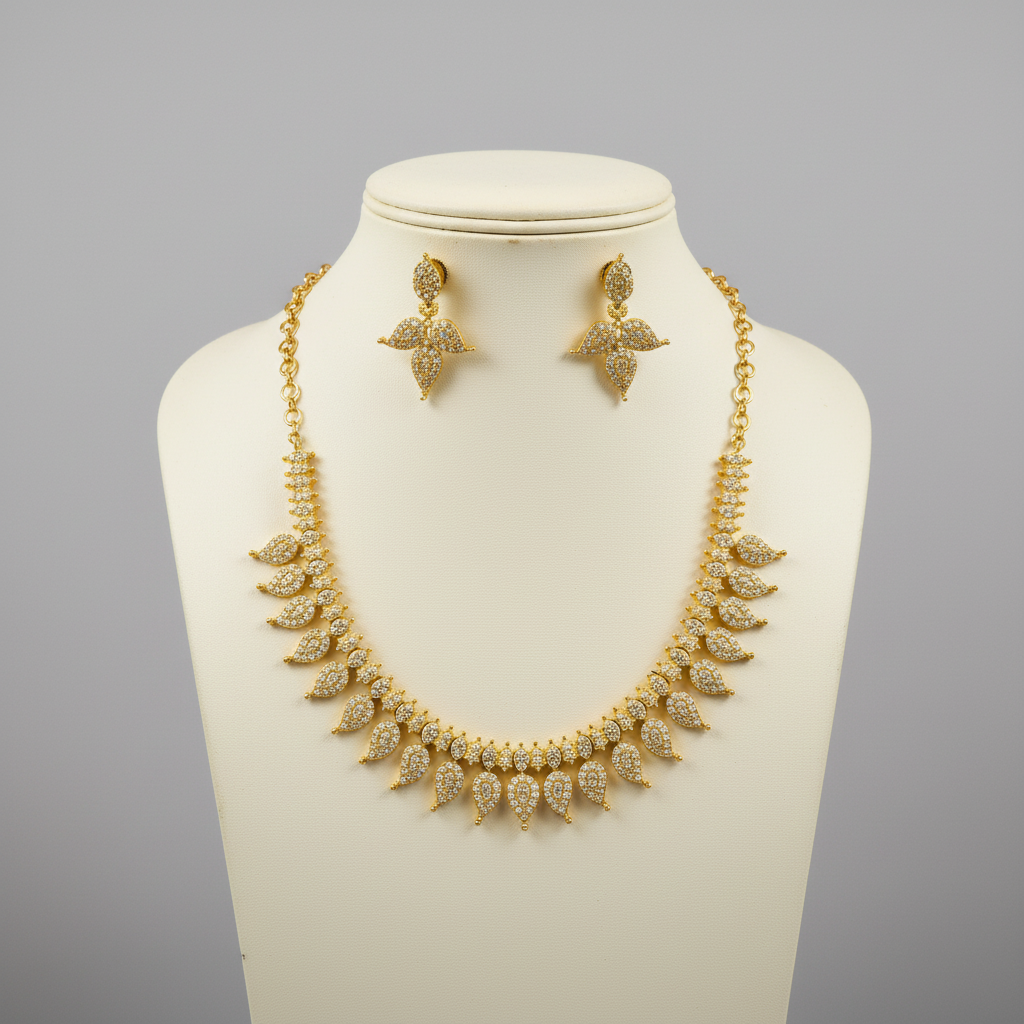 Mannequin display of 24K gold plated zircon mango necklace set