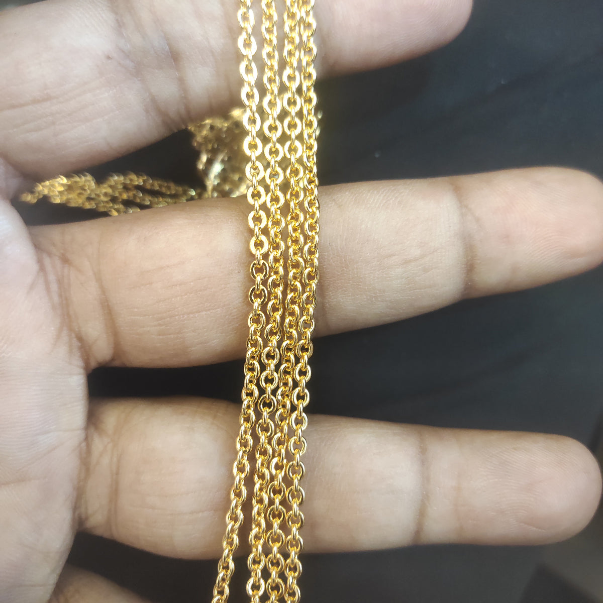 Multi-Strand Gold Chain Necklace with Ornate Floral Centerpiece