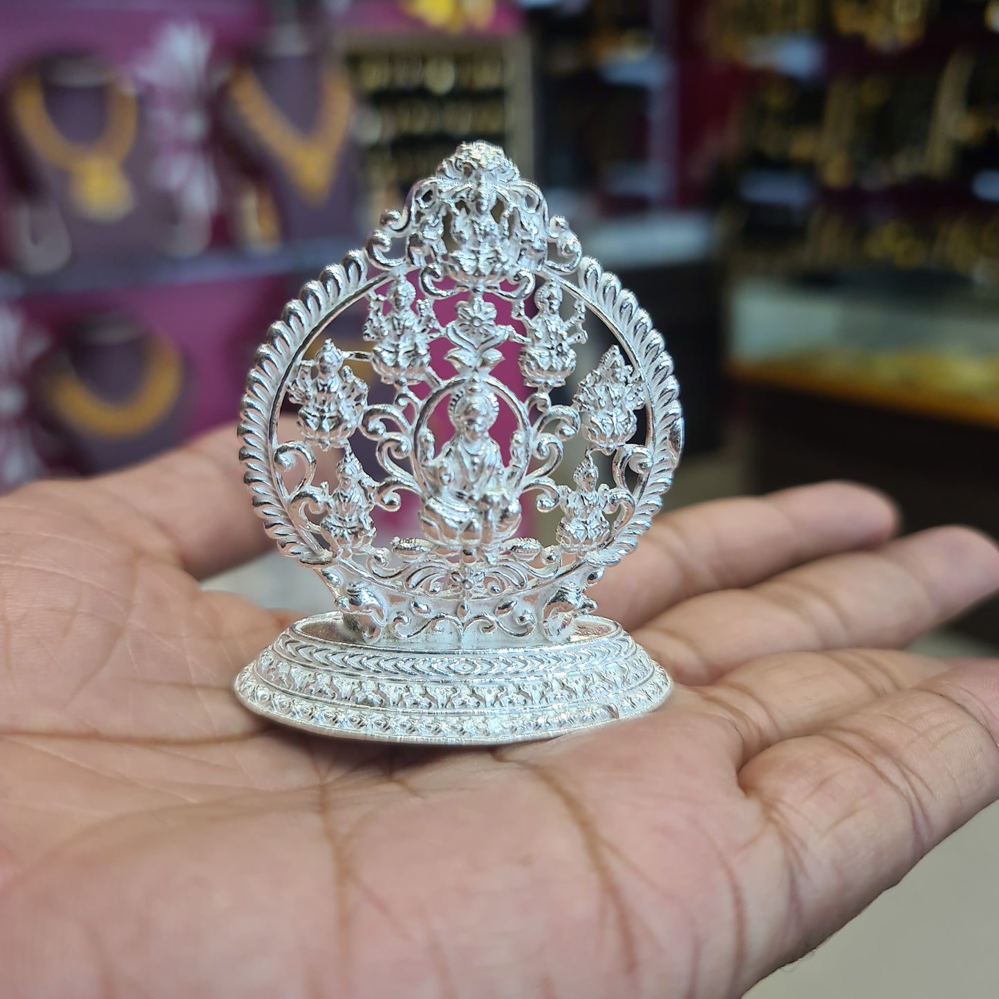 "Crafted Elegance: Handmade Solid Silver Ashtalakshmi Goddess Idol for Divine Décor"