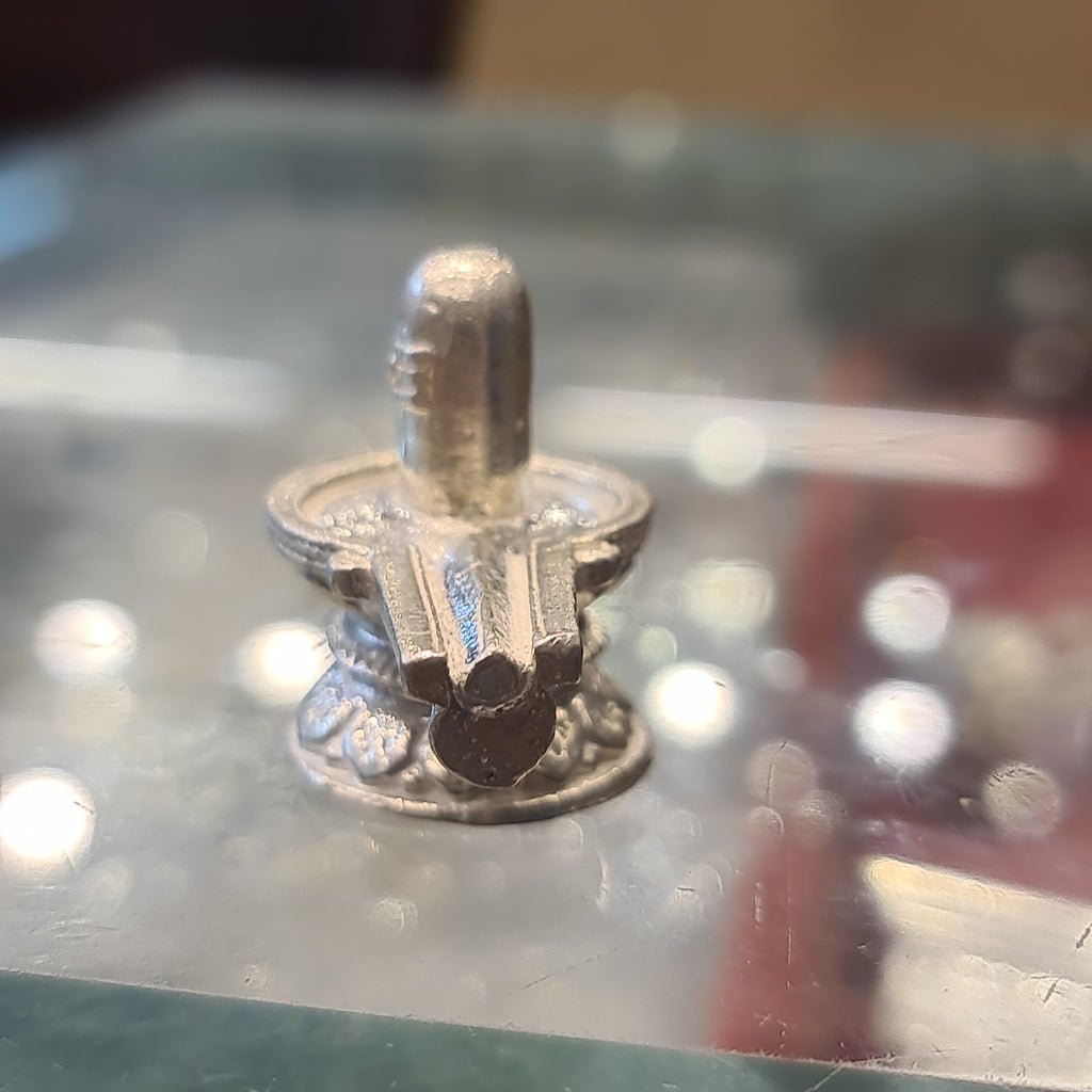 "Shine Bright: The Beauty of a Pure Silver Shiv Ling"