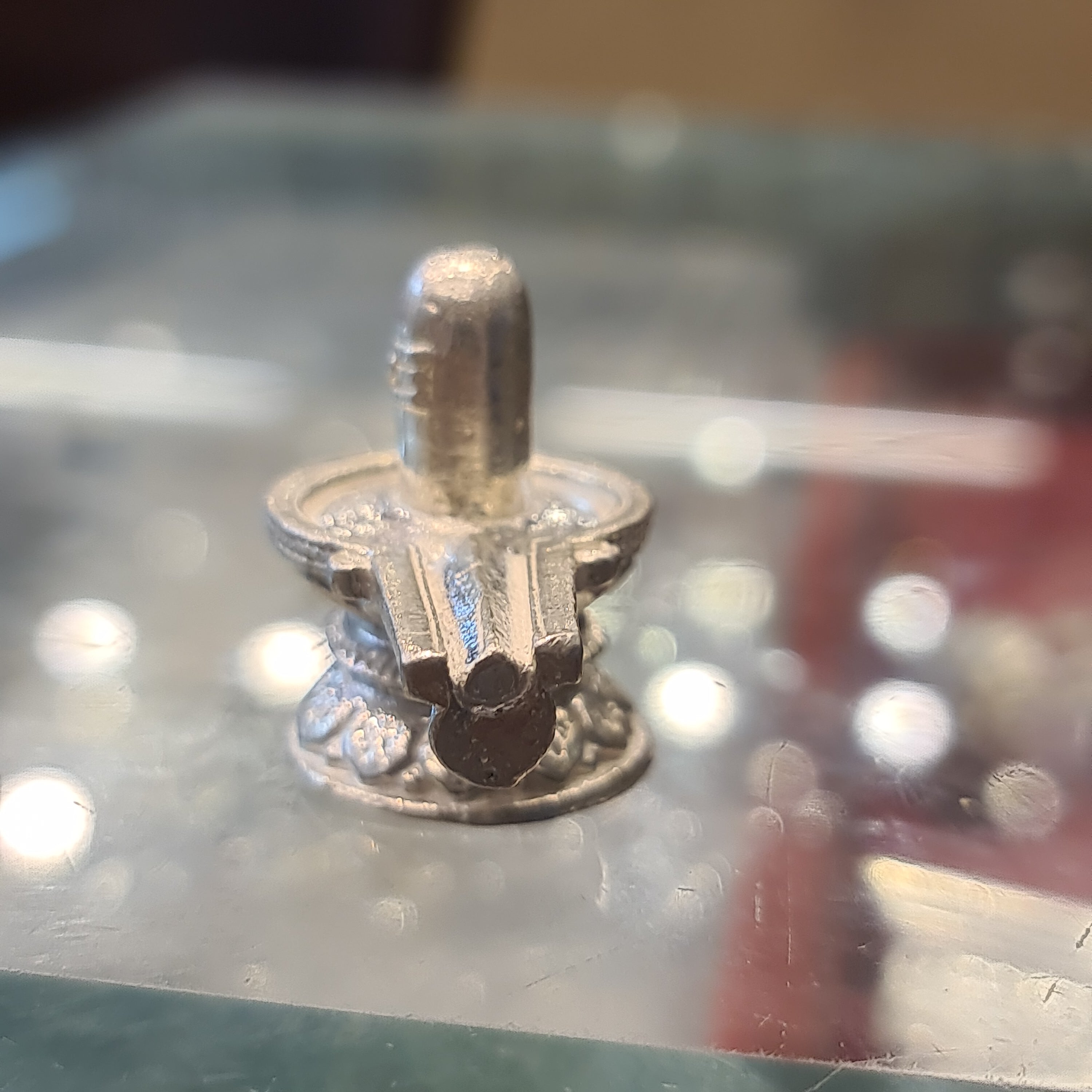 "Shine Bright: The Beauty of a Pure Silver Shiv Ling"
