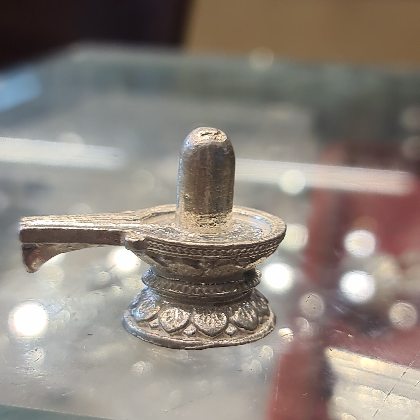 "Shine Bright: The Beauty of a Pure Silver Shiv Ling"