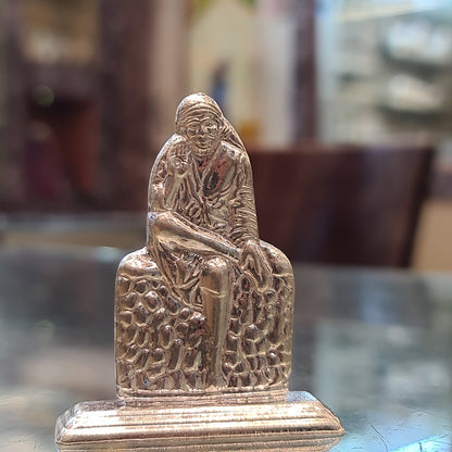 Sacred Brilliance: Handcrafted Pure Silver Sai Baba Idol for Divine Blessings"