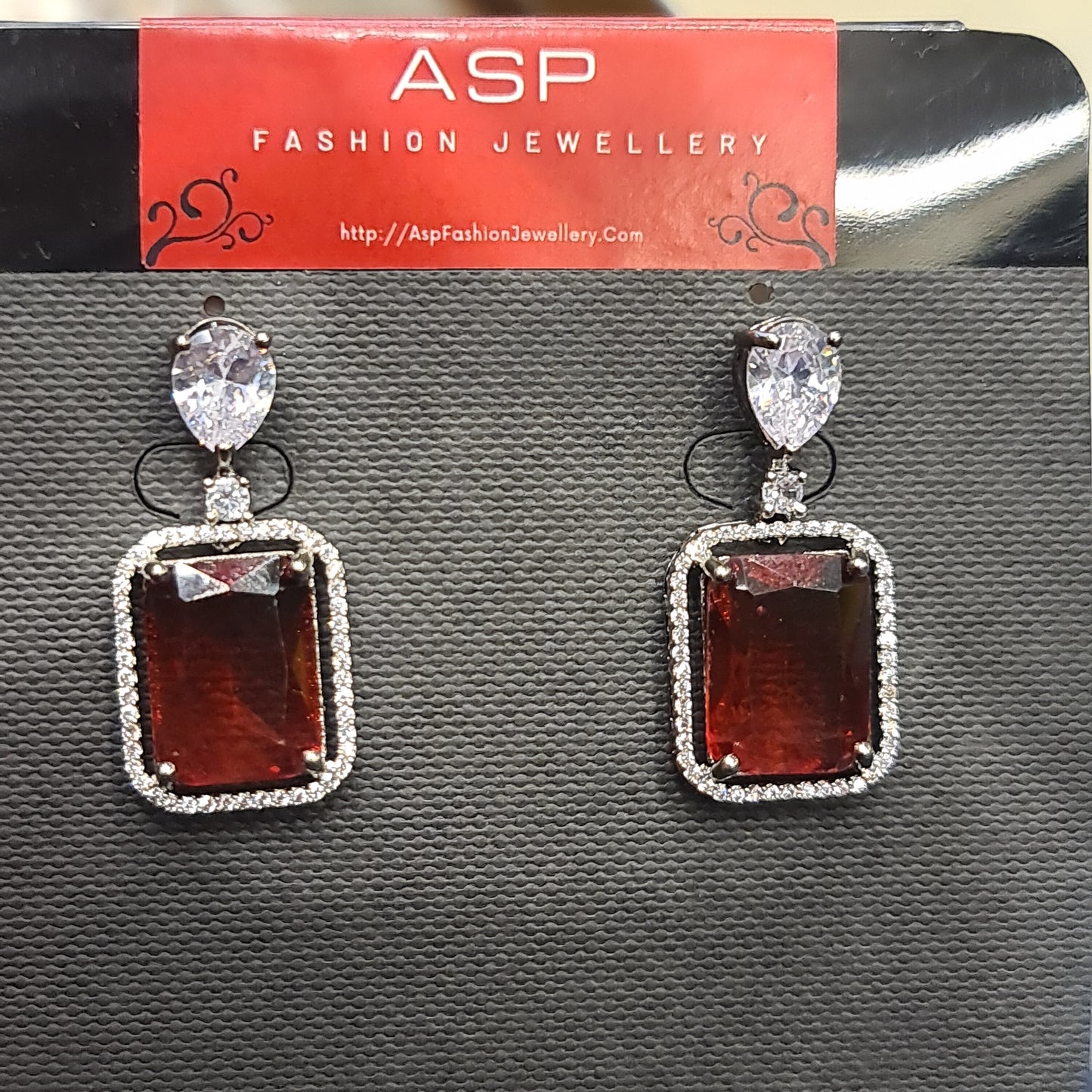 "Dazzling Elegance: Silver Plated American Diamond Dangle Earrings to Elevate Your Style"