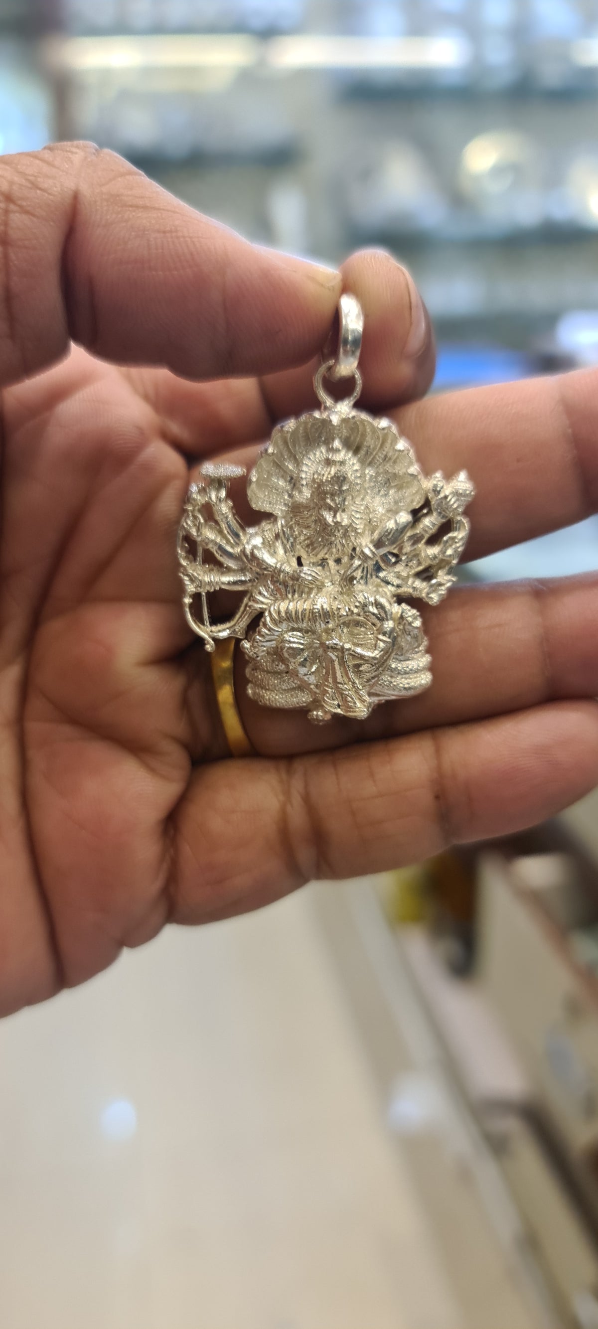 Unleashing Sacred Strength: The Radiant Silver Narsimha Swami Pendant