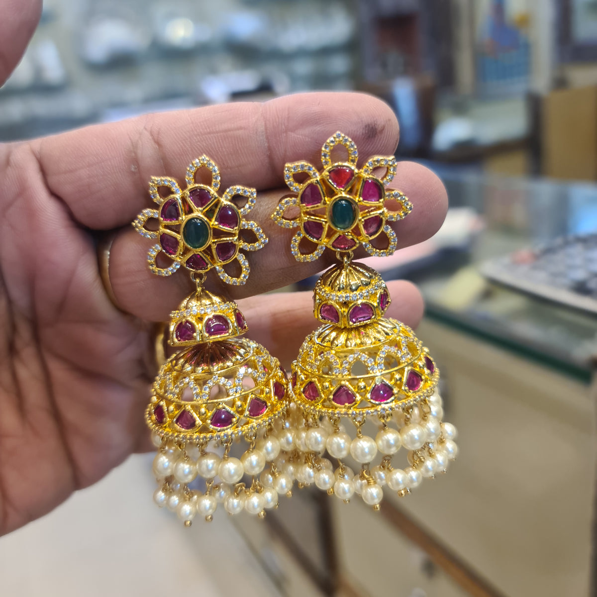 Kempu Emerald Jhumka Earrings | Gold-Plated Temple Jewellery with Pearl Drops