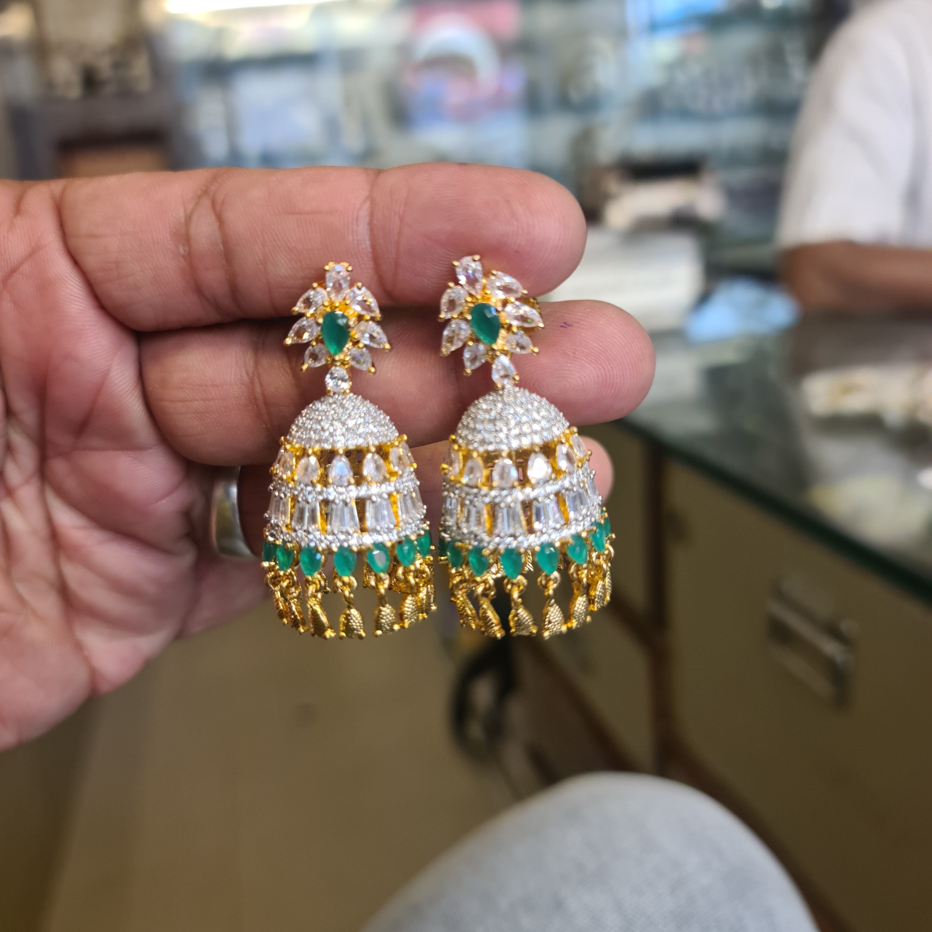 CZ Emerald Jhumki Earrings | Push Back | Gold Tone