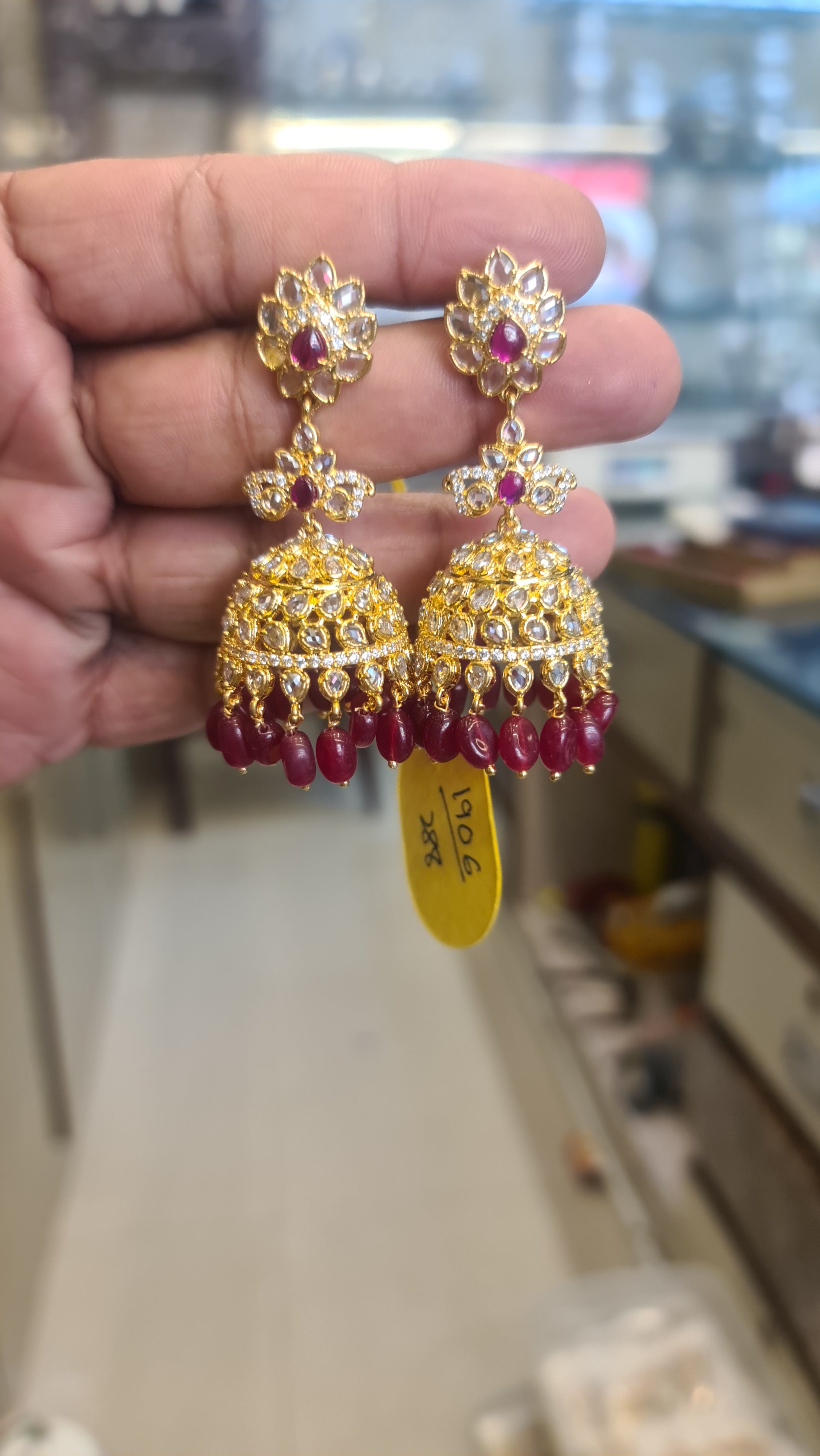 Gold Polki Lotus Jhumka with Ruby Bead Drops