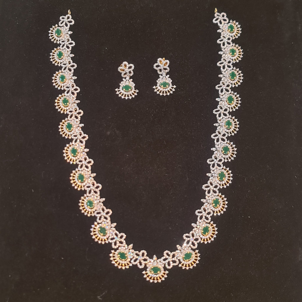 Emerald CZ diamond replica necklace set with earrings on black velvet display