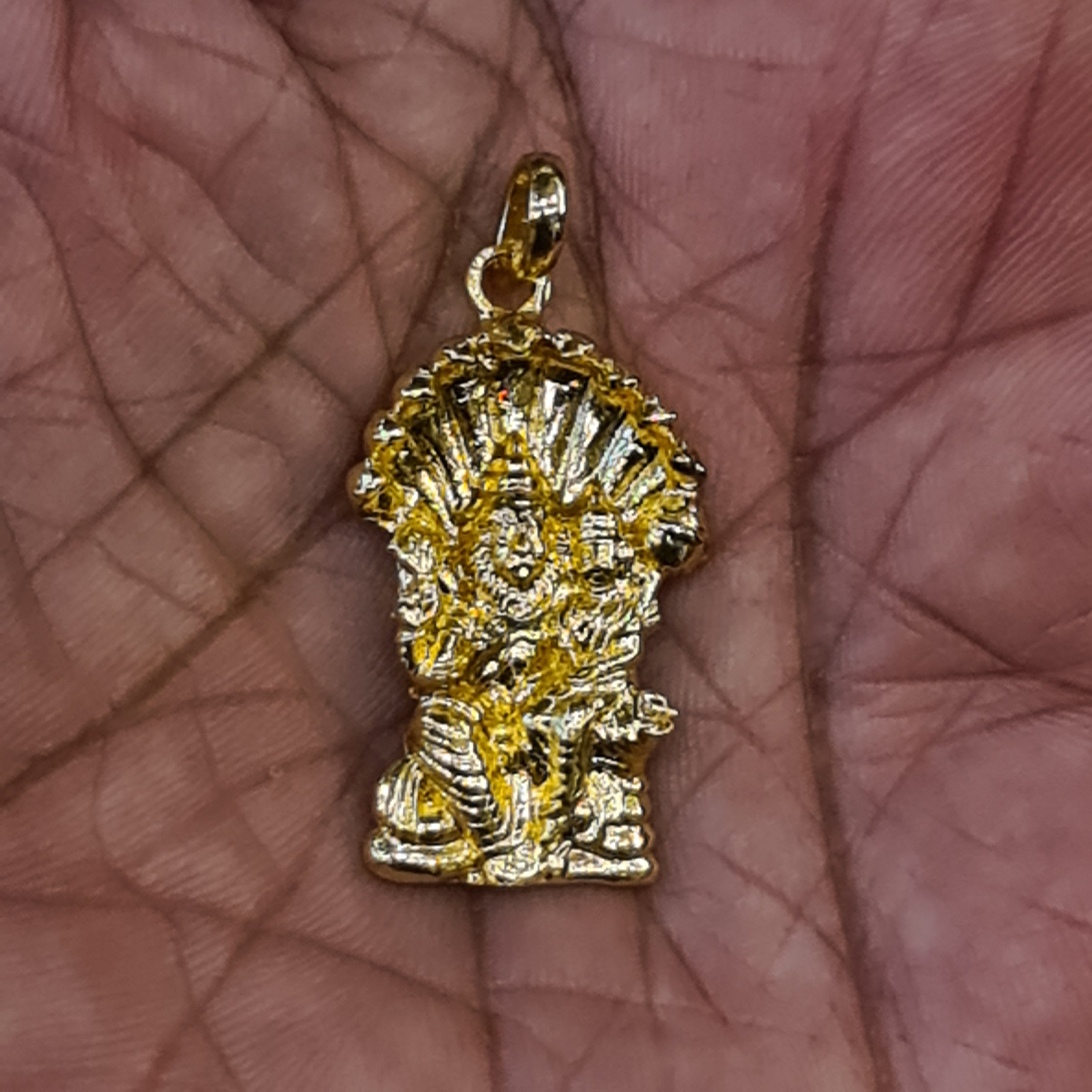 Panch Loham Lakshmi Narasimha Swami Locket held in palm