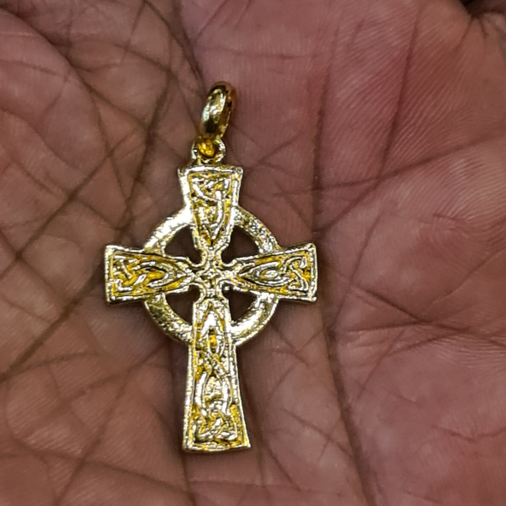 Panch Loham Celtic Cross Locket held in palm