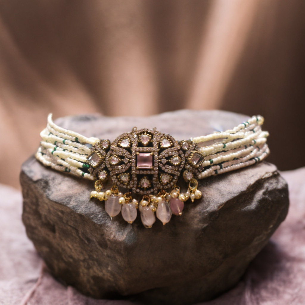  Choker Necklace with beads and stones on a stone surface