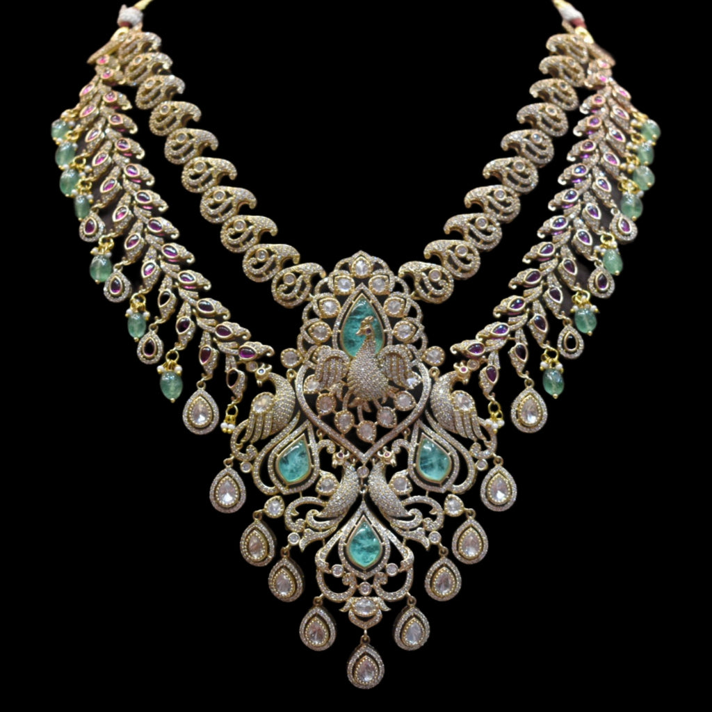 Ornate necklace with gemstones on a black background