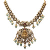 Ornate necklace with gemstones on a white background
