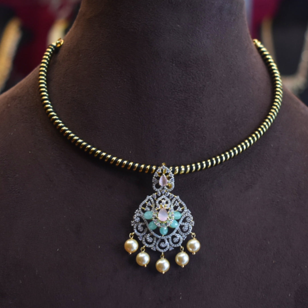 Decorative necklace with pendant on a mannequin