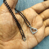 "Glimmering Elegance: Sterling Silver Heart Pendant Mangalsutra with Black Beads"