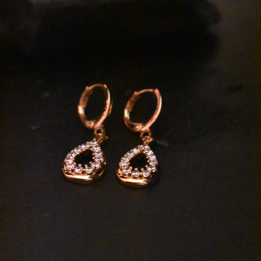 "Glimmering Rose: Elevate Your Style with Asp Fashion's Rose Gold Drop Earrings"