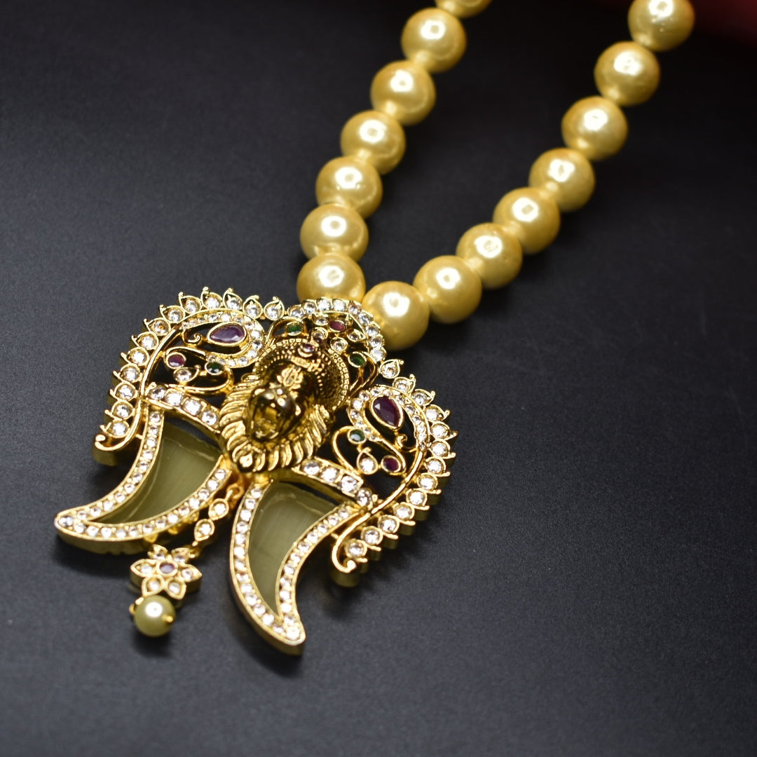 "Timeless Elegance: Antique Narsimha Swami Puligoru Pendant Adorned with Pearls"