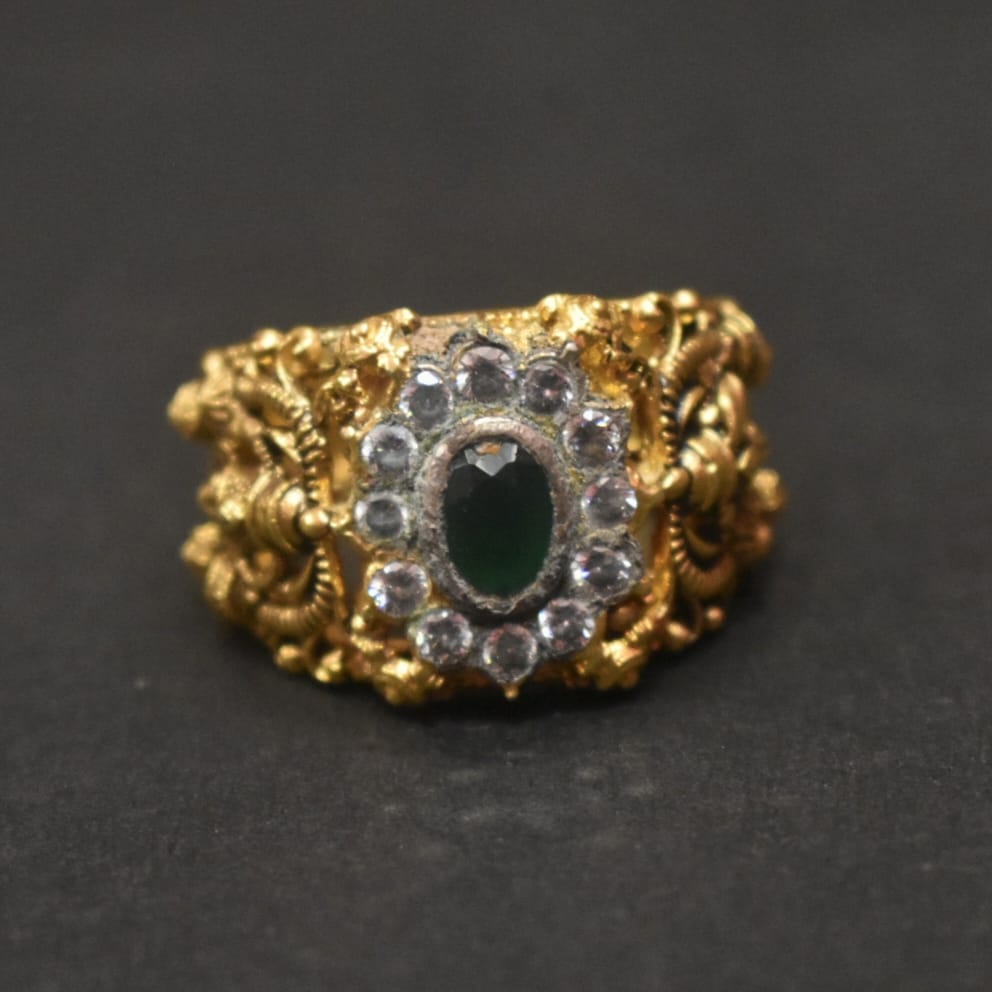 Shine Bright with the 92.5 Silver Gold-Plated Venkateswara Swami Ring Adorned with Emerald