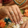 Title
Panchaloha Navratna Finger Ring
