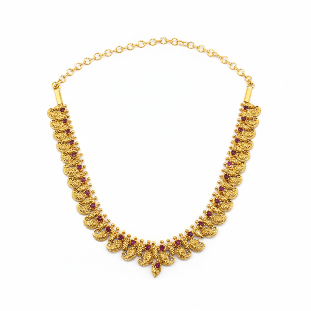 Traditional temple peacock necklace with 24K gold plating and ruby stones on white background