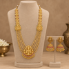 Antique Lakshmi long haram and matching jhumka earrings displayed on mannequin