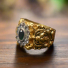 Shine Bright with the 92.5 Silver Gold-Plated Venkateswara Swami Ring Adorned with Emerald
