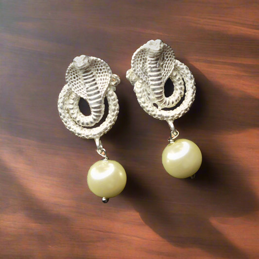 "Sleek and Stylish: Embrace Your Wild Side with Silver Snake Earrings"