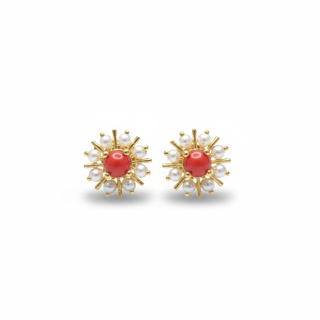 Coral pearl stud earrings on white background