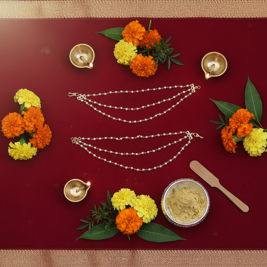 Cultural flat lay with pearl jewelry