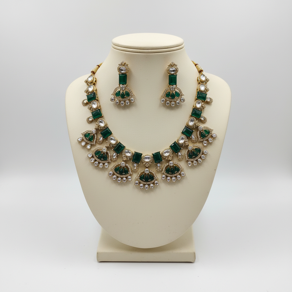 Emerald green gemstone jewelry set on mannequin display