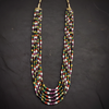 Flat lay Navratna multi-strand beaded necklace