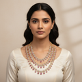 Front-facing lifestyle photo of model wearing necklace