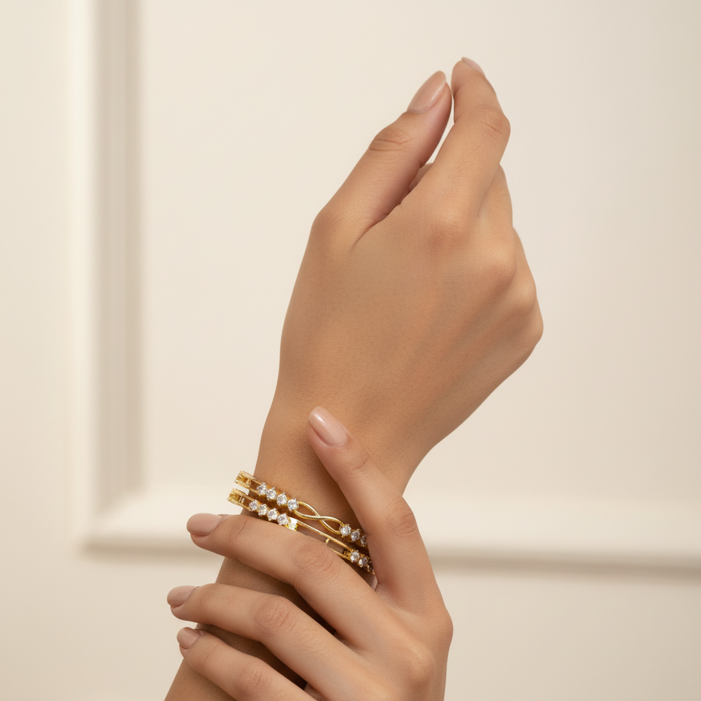 Gold bangles lifestyle shot on wrist