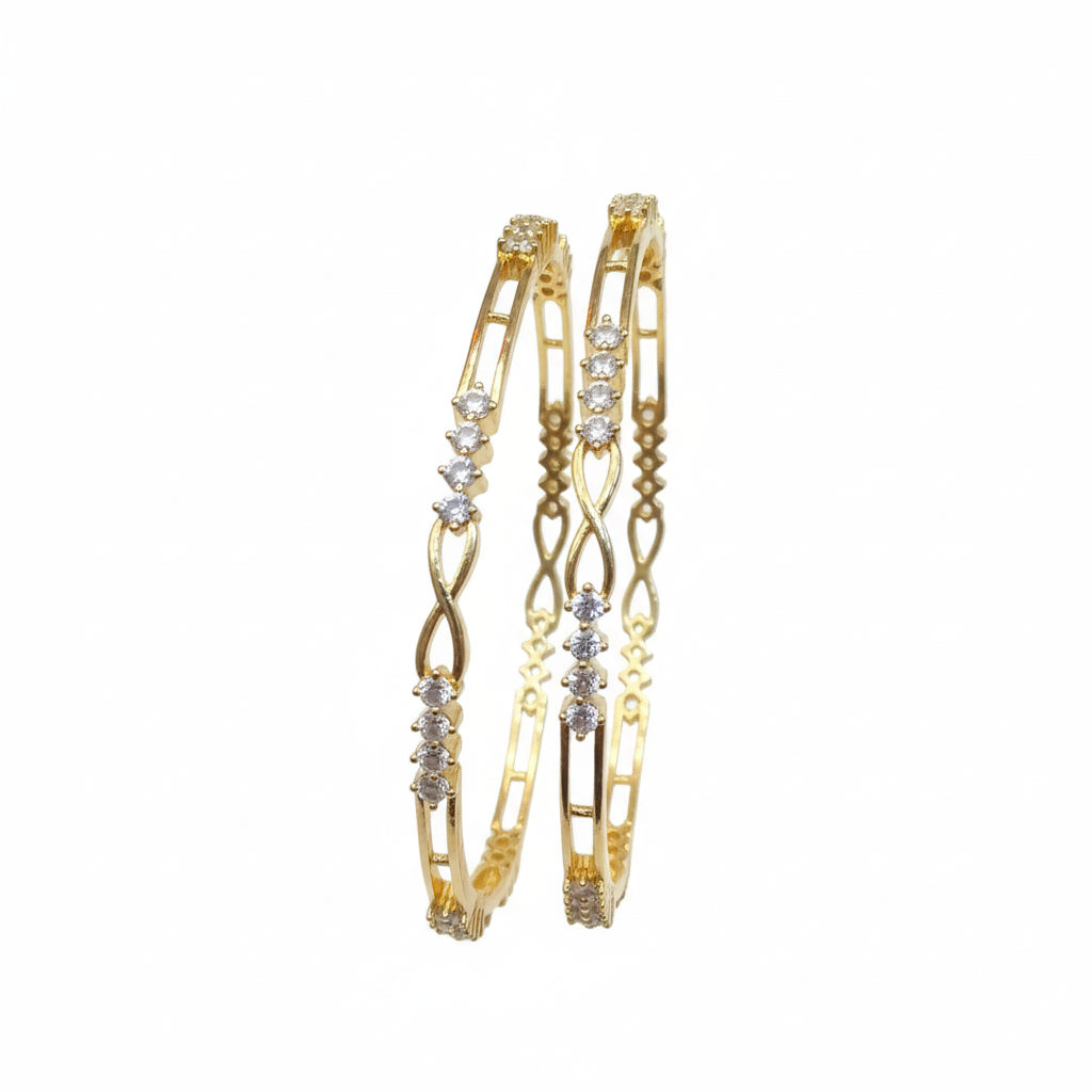 Gold bangles on white background