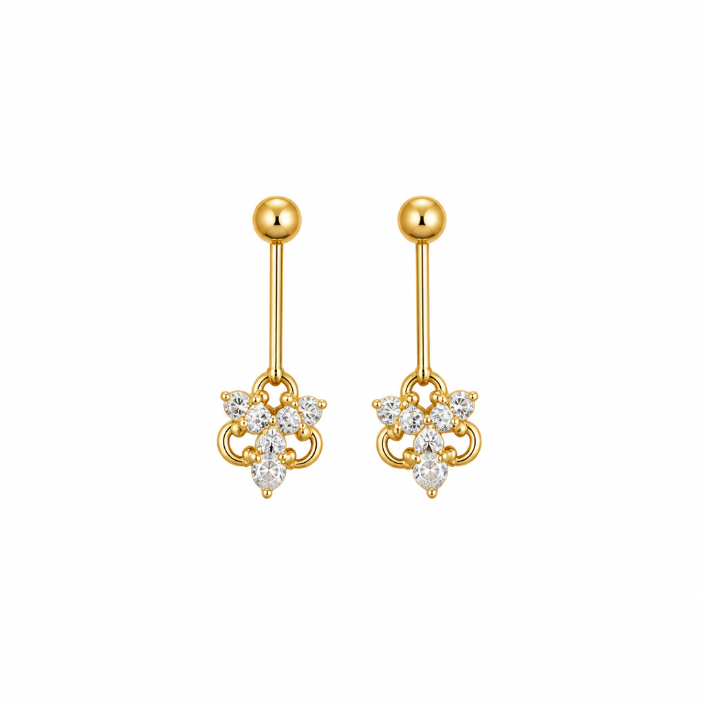 Gold drop earrings with flower-shaped crystal cluster charm on white background