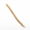 Gold jewelry on white background