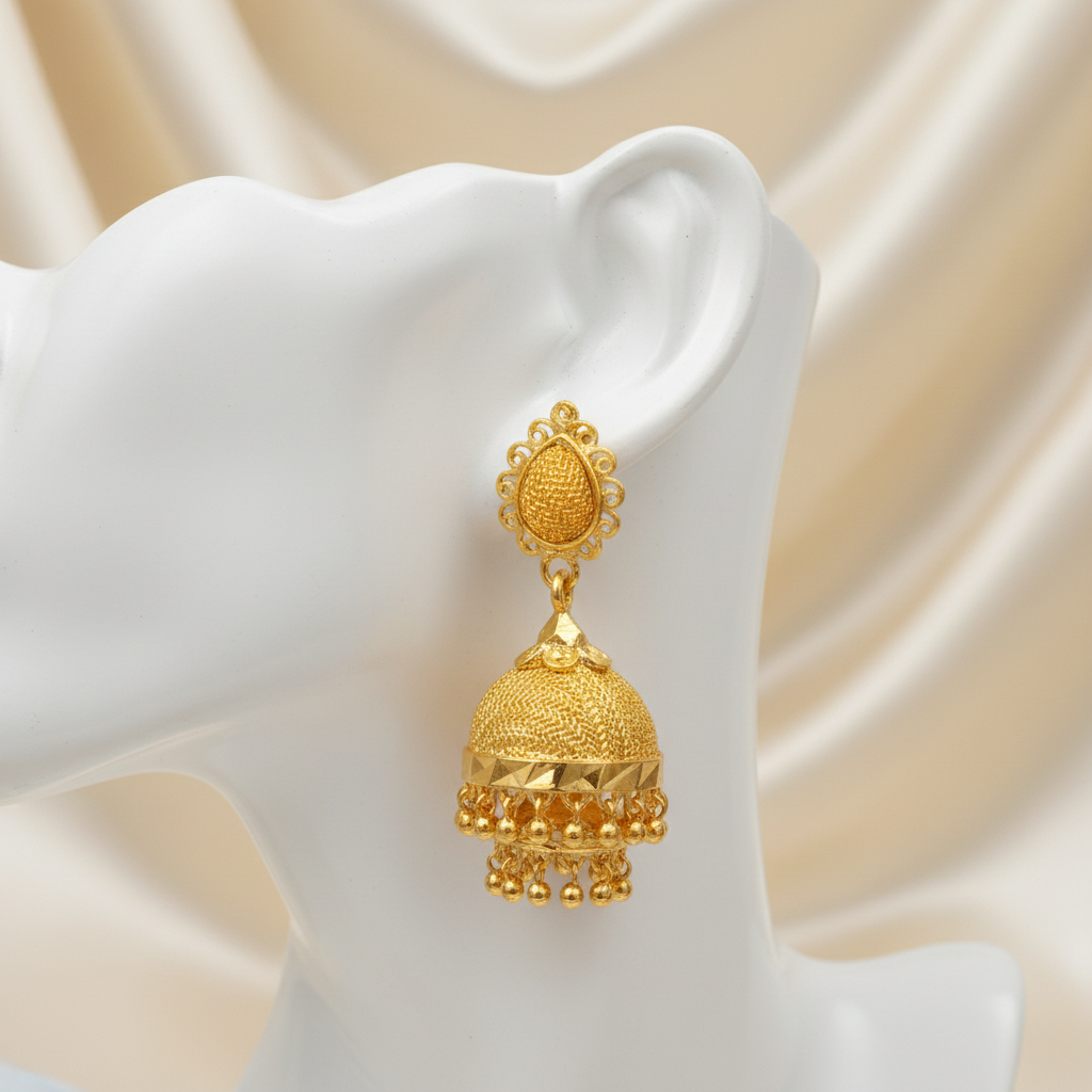 Gold Jhumka Earrings on Mannequin