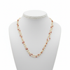 2-strand pearl and coral beaded necklace on white mannequin bust - front view