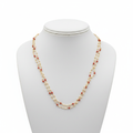 2-strand pearl and coral beaded necklace on white mannequin bust - front view