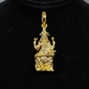 Close-up macro of Dakshinamurthy gold pendant showing four arms and intricate carving