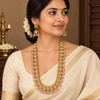Illustrative square model wearing Lakshmi haram and earrings