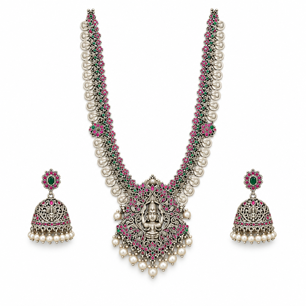 Oxidized Lakshmi long haram necklace with matching jhumka earrings on a white background