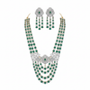 Emerald green and diamond multi-layer bridal necklace set with matching earrings on white background