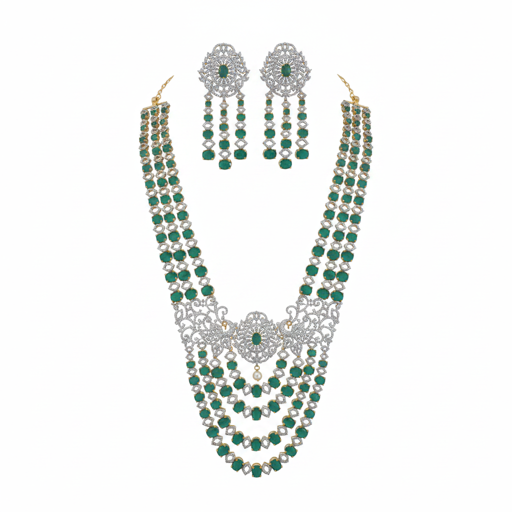 Emerald green and diamond multi-layer bridal necklace set with matching earrings on white background