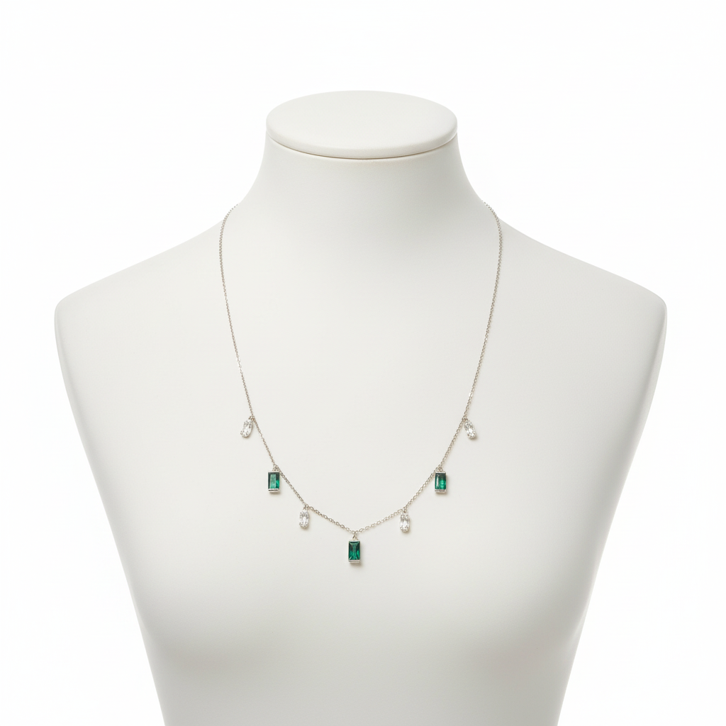 925 silver emerald necklace displayed on white mannequin