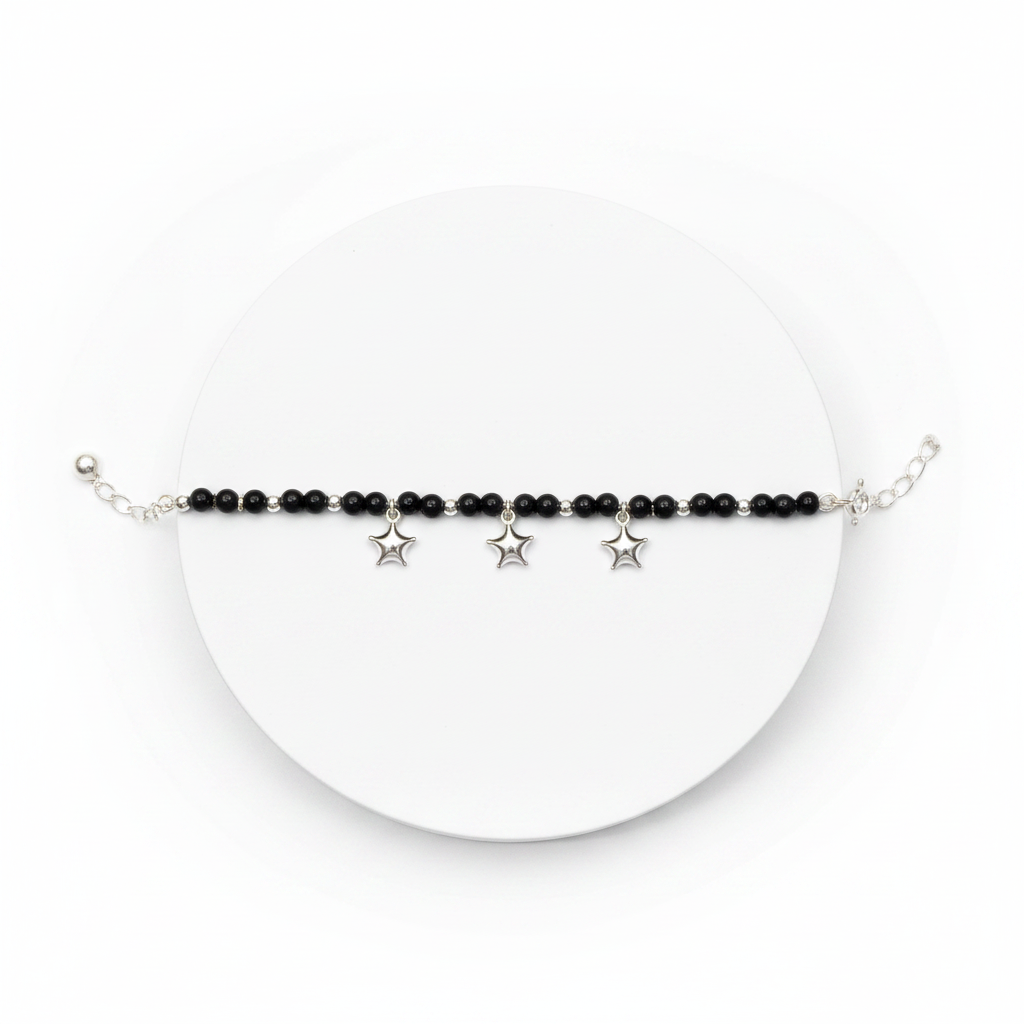 92.5 Silver Kids Bracelet with Sparkling 4-Pointed Star Charms on white background