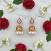 Jadau Kundan Teardrop Jhumka flat lay with roses – lifestyle styling