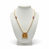 Narasimha temple pearl necklace displayed on mannequin