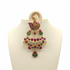 Kempu Polki Chandbali Earrings ruby emerald on mannequin ear stand